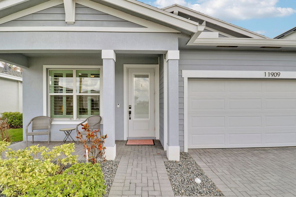 Photo of 11909 SW Lyra Drive, Port Saint Lucie, FL 34987 (MLS # B26008404)