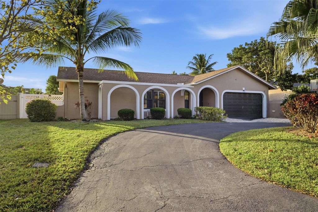 Photo of 2702 NW 98th Way, Coral Springs, FL 33065 (MLS # F10534833)