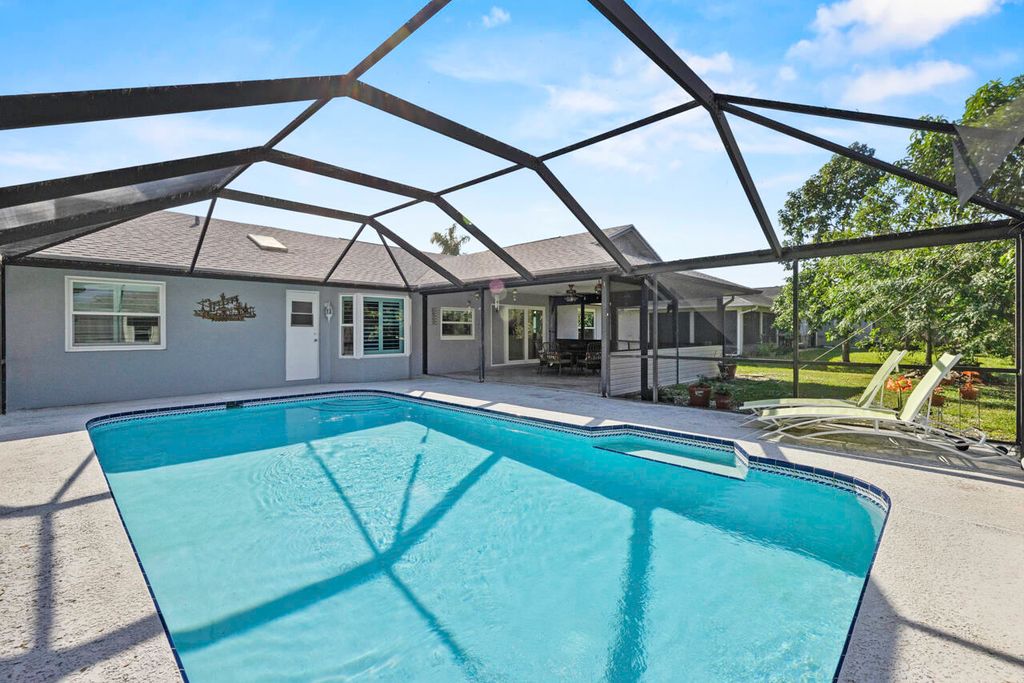 Photo of 2329 SW Fern Circle, Port Saint Lucie, FL 34953 (MLS # R11146090)