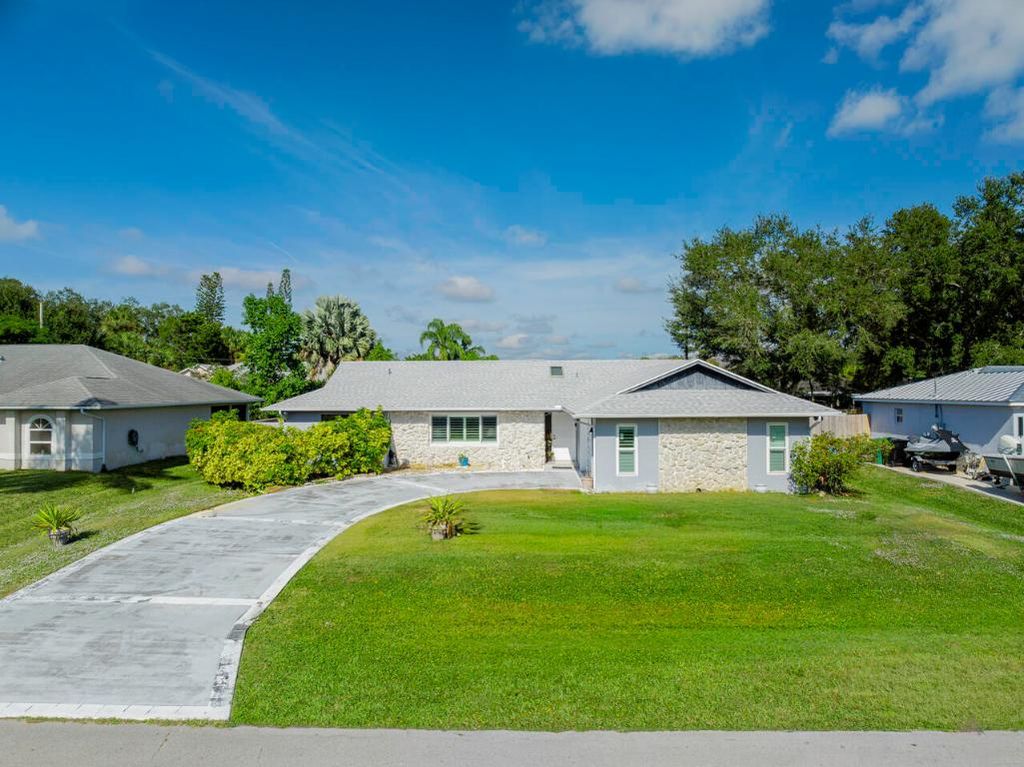 Photo of 2329 SW Fern Circle, Port Saint Lucie, FL 34953 (MLS # R11146090)