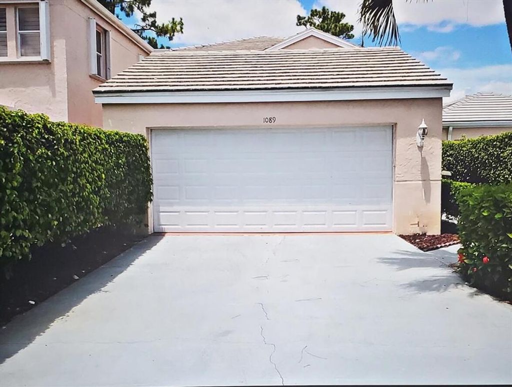 Photo of 1089 Island Manor Drive Dr, Greenacres, FL 33413 (MLS # R10776390)