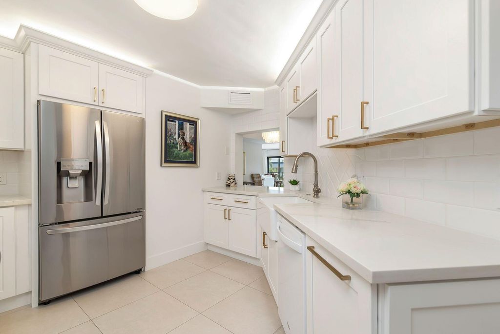 Photo of 327 Southwind Drive #206, North Palm Beach, FL 33408 (MLS # R11113846)