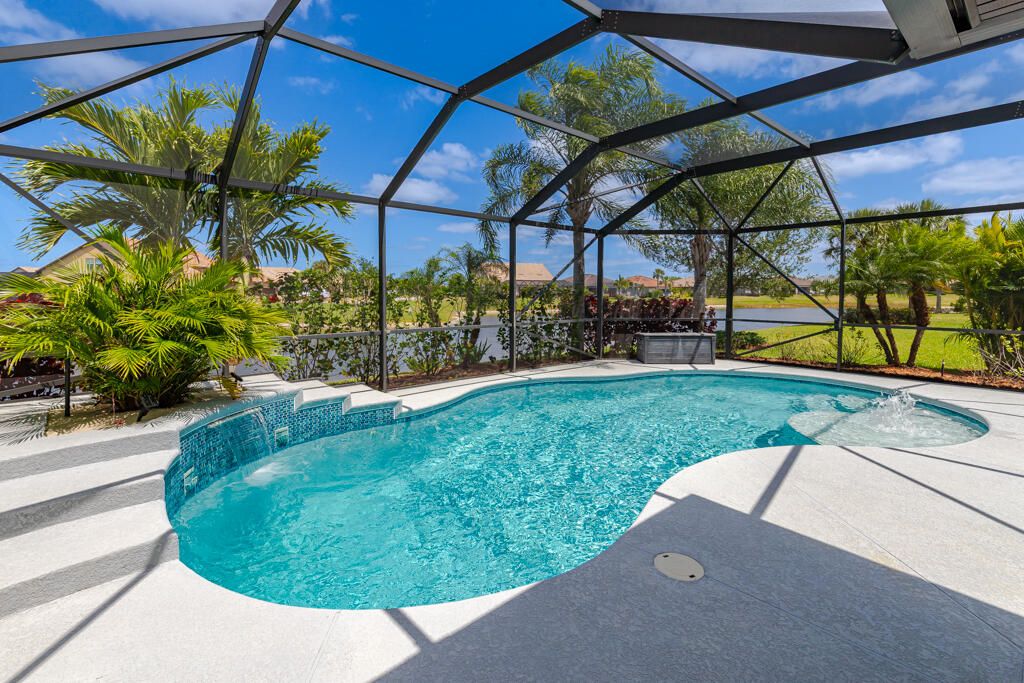 Photo of 348 SE Courances Drive, Port Saint Lucie, FL 34984 (MLS # B26026904)
