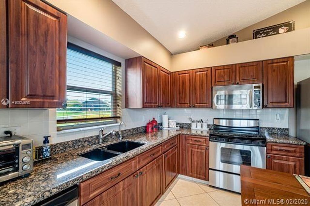 Photo of 14181 Castlerock Way, Delray Beach, FL 33446 (MLS # R11140565)