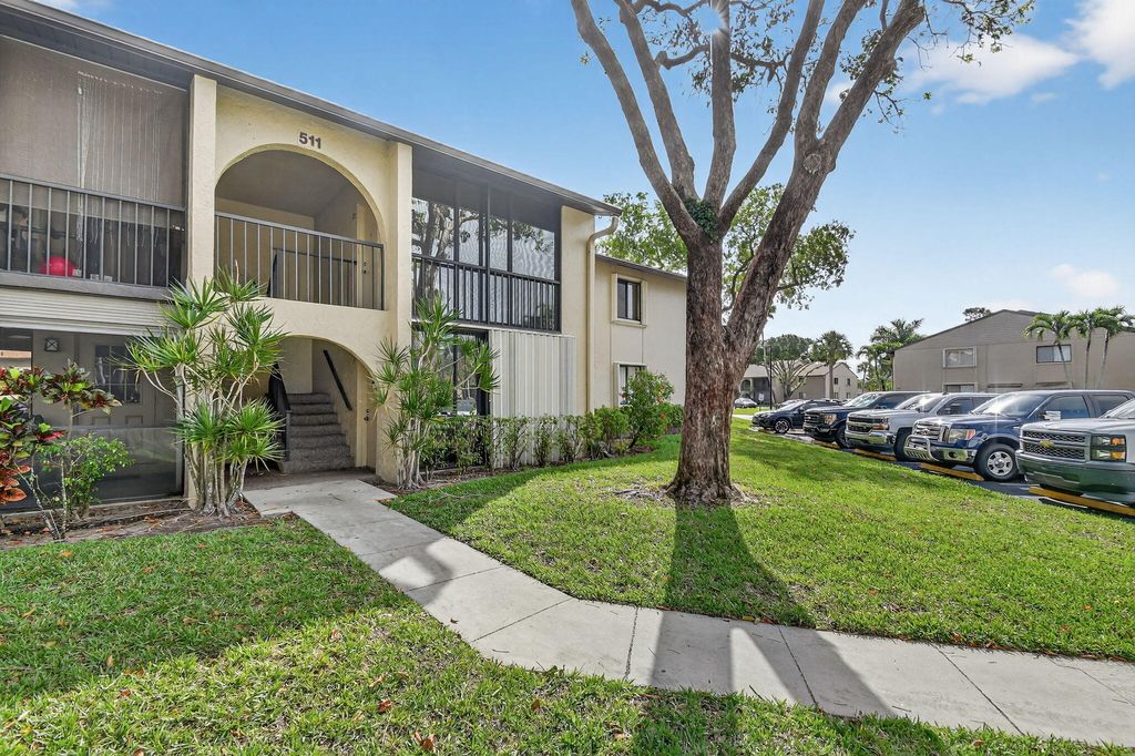 Photo of 511 Shady Pine Way #D2, Greenacres, FL 33415 (MLS # B26012552)