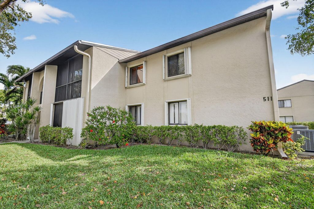 Photo of 511 Shady Pine Way #D2, Greenacres, FL 33415 (MLS # B26012552)