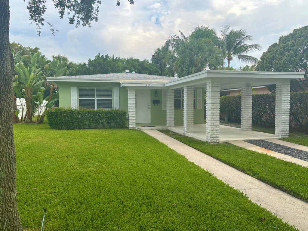 Photo of 218 Seville Road, West Palm Beach, FL 33405 (MLS # B26039066)