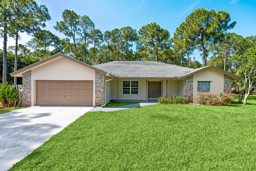 Photo of 16628 Valencia Boulevard, The Acreage, FL 33470 (MLS # B26050117)