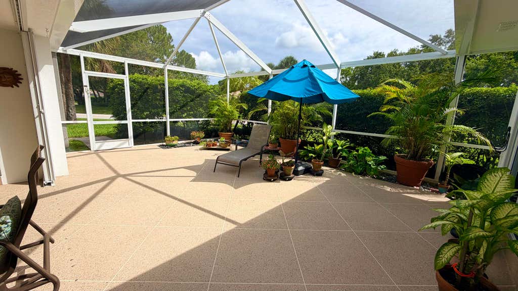 Photo of 10301 Chapman Oak Court, Palm Beach Gardens, FL 33410 (MLS # B26045370)