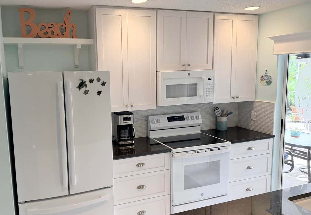 Photo of 10301 Chapman Oak Court, Palm Beach Gardens, FL 33410 (MLS # B26045370)