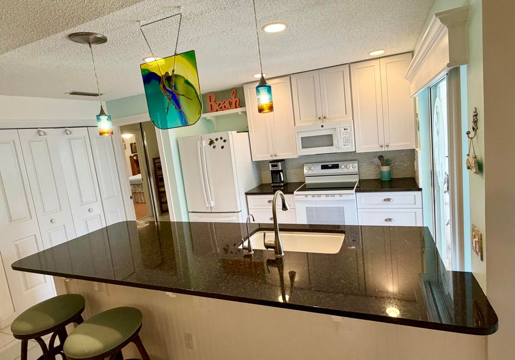 Photo of 10301 Chapman Oak Court, Palm Beach Gardens, FL 33410 (MLS # B26045370)