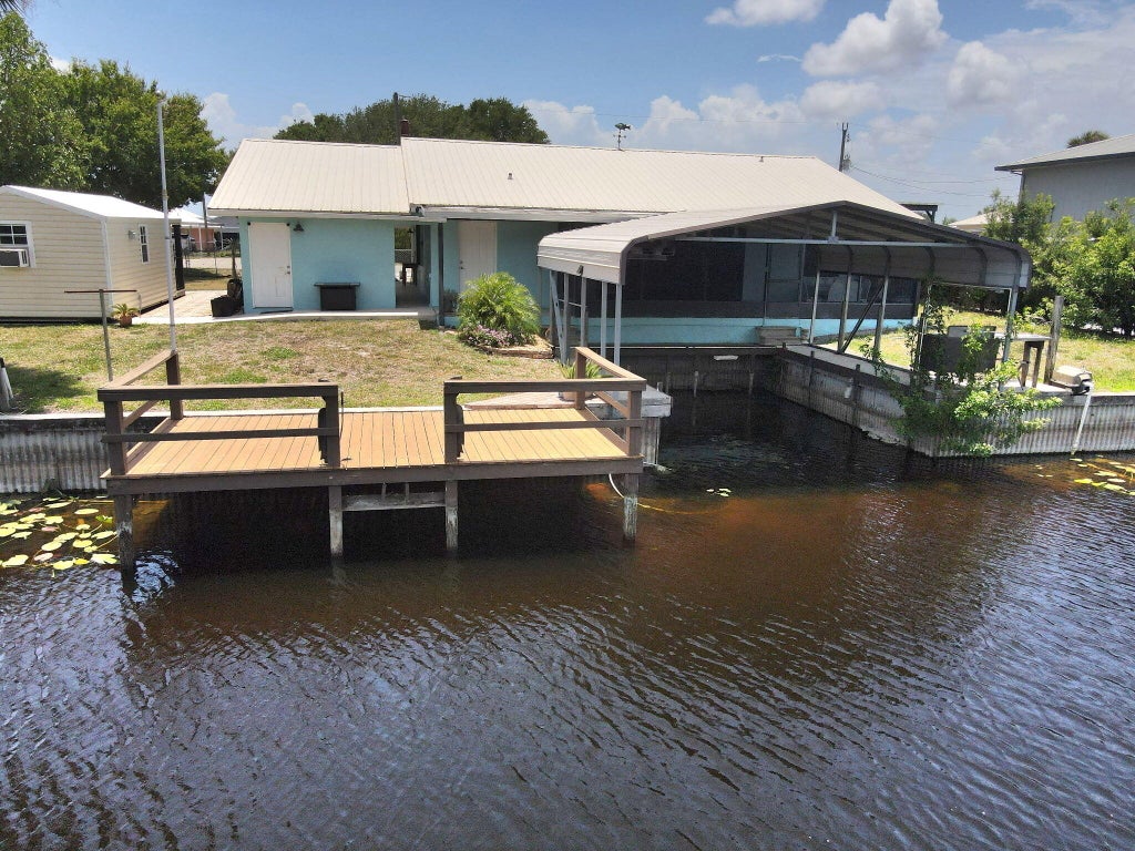 Photo of 1115 Elm Street, Okeechobee, FL 34974 (MLS # B26034971)