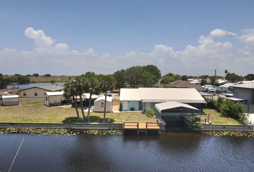 Photo of 1115 Elm Street, Okeechobee, FL 34974 (MLS # B26034971)