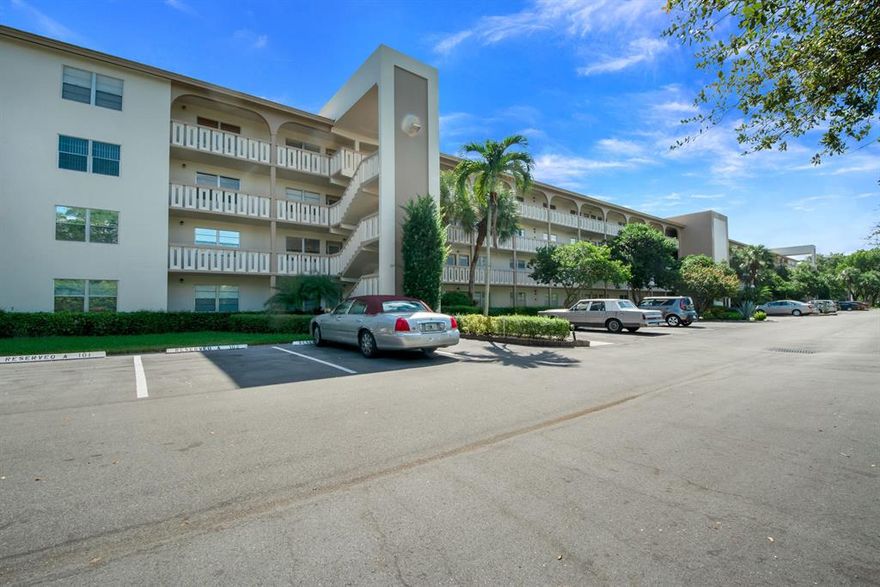 Resort style living...Imagine sitting on your screen enclosed balcony overlooking lush green space and pool. Inside your condo are two bedrooms with two baths in a spacious 1161 square feet. Second floor in an elevator building.  Wynmoor is a Country Club golf community without the heavy membership fees...Amenities galore...Golf Course, Pool, Restaurant, Theater, Pools, Tennis, Gym, Basketball, numerous social clubs...Fantastic location close - 25 min to the Ft. Lauderdale Airport or Downtown Ft. Lauderdale, Broward Center for the Performing Arts, Las Olas and Ft. Lauderdale Beach.