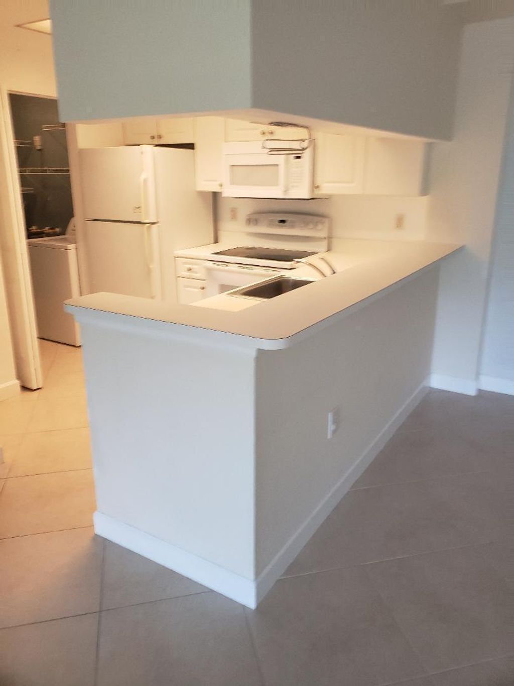 Photo of 2802 Sarento Place #202, Palm Beach Gardens, FL 33410 (MLS # B26007108)