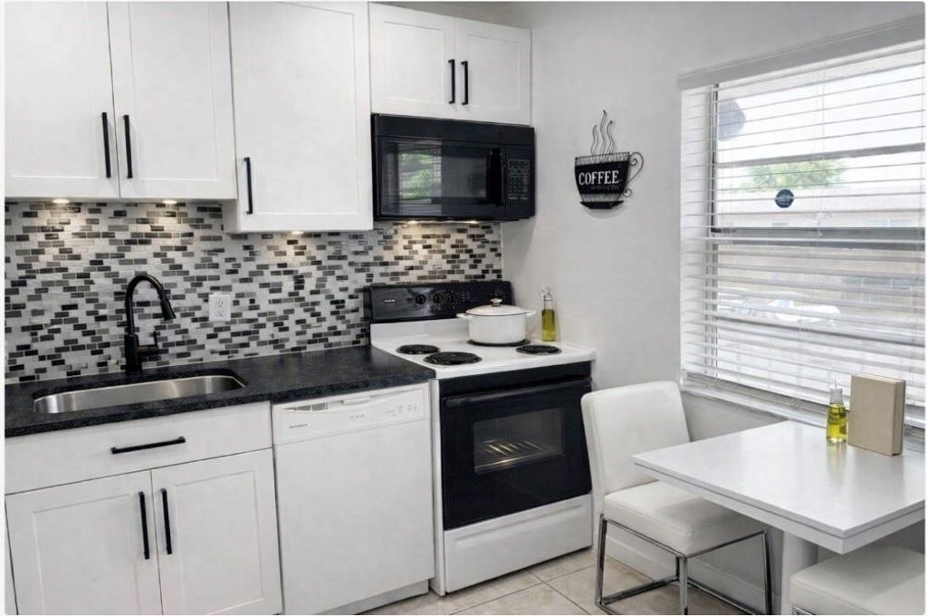 Photo of 7505 NW 5th Place #203, Margate, FL 33063 (MLS # B26042510)