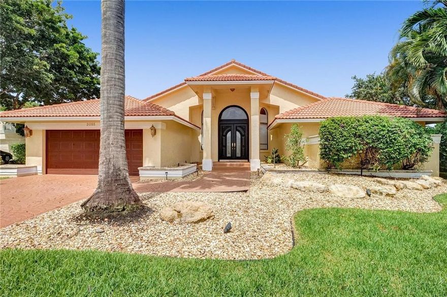 Beautiful home located in the wonderful gated community of Eagle Trace. This 4 bedroom Mediterranean style home offers a enchanting castle feel from the moment you pull up. Step inside and immediately be greeted with volume ceilings and a grand living space. Large kitchen with island is perfect for entertaining. Floor to ceiling windows bring in natural light and over look the beautiful pool deck and backyard space. Oversized heated pool and jacuzzi. Covered patio to escape the summer rain. Beautiful travertine marble floors throughout home. Split floor plan. Large master suite with soaking tub, shower, double vanities and two walk in closets. Jack and Jill bath connects two of the remaining three bedrooms. Custom closets in all bedrooms. Enjoy all that this home has to offer.