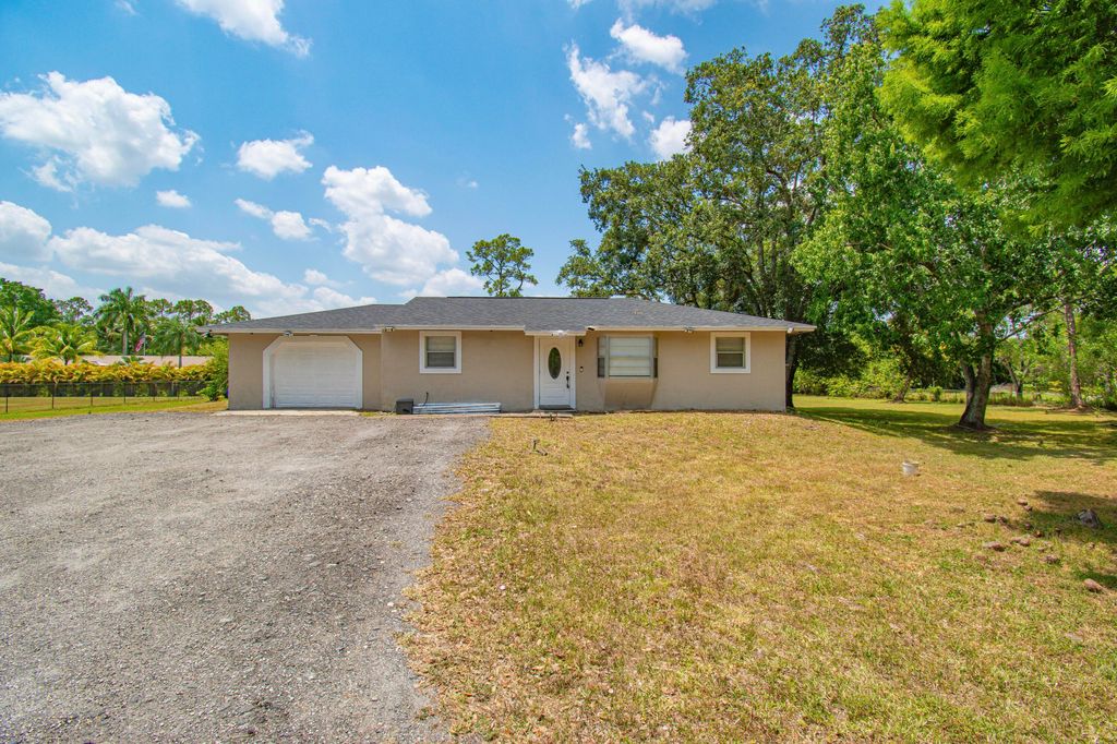Photo of 13836 41st Lane N, West Palm Beach, FL 33411 (MLS # R10993593)