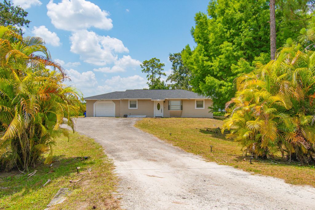 Photo of 13836 41st Lane N, West Palm Beach, FL 33411 (MLS # R10993593)