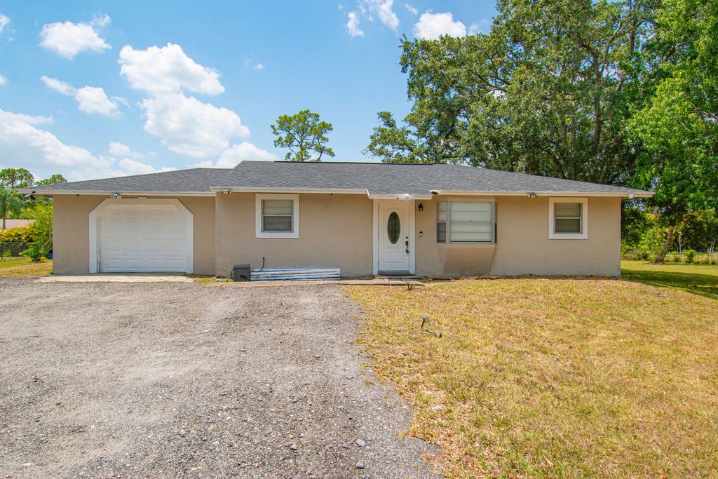 Photo of 13836 41st Lane N, West Palm Beach, FL 33411 (MLS # R10993593)
