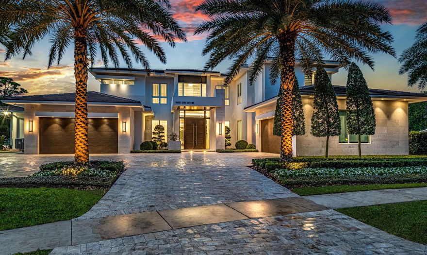 VERY RARE COMBINATION OF FURNISHED NEWER CONSTRUCTION AND CENTRAL BOCA RATON LOCATION - within 8 minutes of Pine Crest and St. Andrews Schools and world class shopping and dining at Town Center at Boca Raton. Custom built in 2019 by National Custom Homes, architecture by Brenner Architecture Group, Interior design by NLI Design Studio, this 6 Bedroom, 6.2 Bath Chic Estate with 10,212A+/- Total Living Square feet is sited on a stunning .53 Acre+/- LAKEFRONT lot in highly sought after Boca Bath & Tennis. Greeting residents with a stately double-door entrance, the grand foyer reveals artistic light fixtures, expert craftsmanship, and striking waterfront views. Extending from the foyer are the open-concept dining and living rooms, featuring expansive floor-to-ceiling impact glass sliders