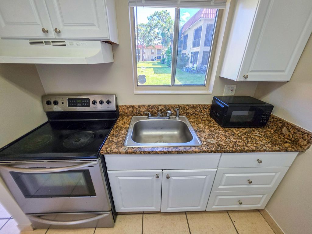 Photo of 6100 Forest Hill Boulevard #109, West Palm Beach, FL 33415 (MLS # B26026256)