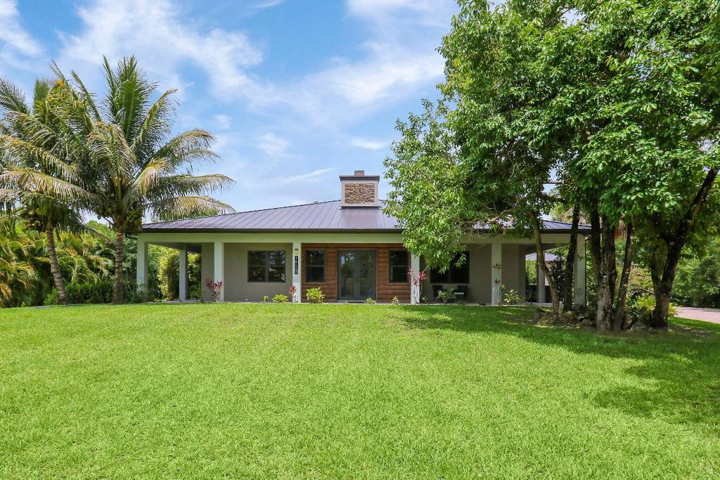 Photo of 16605 123rd Ter Terrace N, Jupiter, FL 33478 (MLS # R10997312)