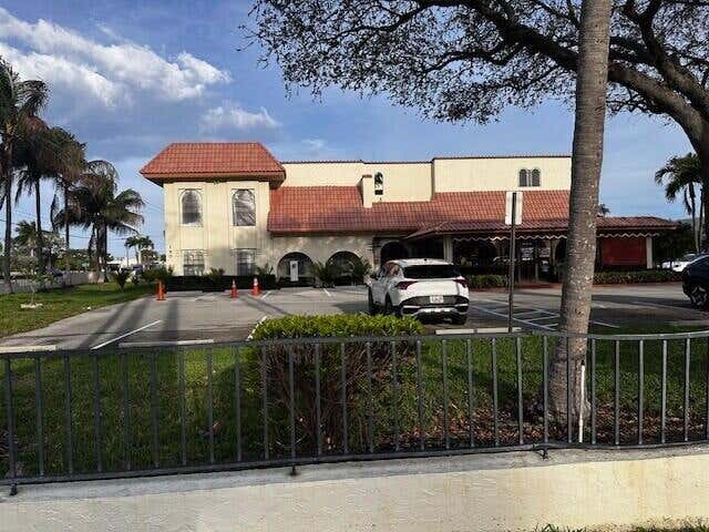 Photo of 190 NW Spanish River Boulevard #202, Boca Raton, FL 33431 (MLS # B26050922)