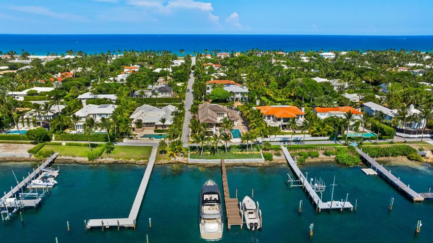 Brand-new construction on North Lake Way built by Wildes Builders and LaBerge and Menard Architect's. Featuring 90 feet of waterfront, a new dock, and luxurious interiors. Upon entering, you are greeted by a grand foyer with Jerusalem Gold limestone flooring that leads into the spacious living areas. The main floor boasts an open kitchen equipped with Gaggenau and Sub-Zero appliances, Taj Mahal stone countertops, an island with seating, and a breakfast area. This space seamlessly flows into the family room, which opens to a covered outdoor loggia overlooking the large pool. Adjacent to the kitchen is a butler's pantry, also outfitted with Taj Mahal stone countertops, and a private dining room for formal gatherings. The separate living room provides additional space for relaxation or or hosting guests. This level also features two powder rooms, a downstairs laundry room, and access to the two-car garage. The home is further enhanced by a whole-house generator for added convenience and security. In addition, this home has a two-car garage with height for car lifts.

An elevator or staircase takes you to the second floor, where a beautiful landing area opens to an oversized terrace. The crown jewel of this level is the primary suite, which includes two large walk-in closets and two luxurious bathrooms one with a separate soaking tub and Vanilla Onyx stone finishes, and the other with Grigio Collemandina marble. The primary suite's private terrace faces west, offering breathtaking sunset views over the Intracoastal.

This home includes four additional guest bedrooms, each with its own en-suite bathroom. Two are located on the main floor, while the other two are upstairs, one of which features a private terrace. A private office with its own balcony provides a serene retreat for work or relaxation.

Deeded beach access on Kenlyn Road.