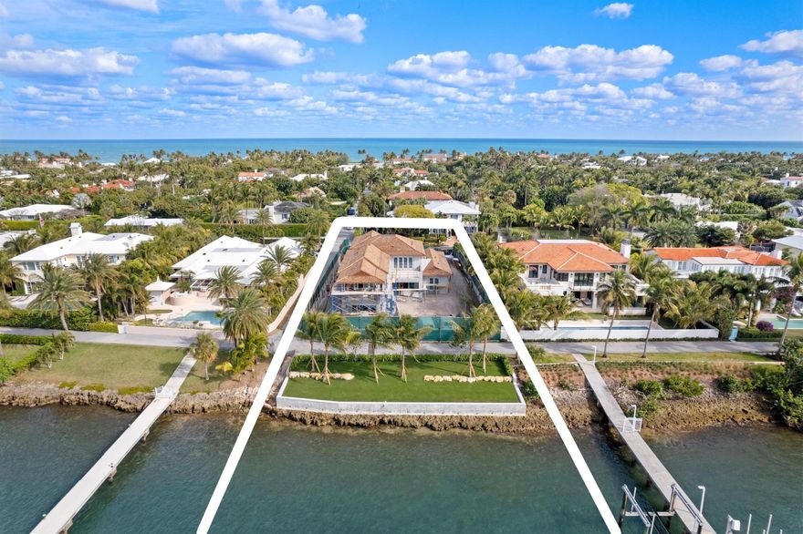 Brand-new construction on North Lake Way built by Wildes Builders and LaBerge and Menard Architect's. Featuring 90 feet of waterfront, a new dock, and luxurious interiors. Upon entering, you are greeted by a grand foyer with Jerusalem Gold limestone flooring that leads into the spacious living areas. The main floor boasts an open kitchen equipped with Gaggenau and Sub-Zero appliances, Taj Mahal stone countertops, an island with seating, and a breakfast area. This space seamlessly flows into the family room, which opens to a covered outdoor loggia overlooking the large pool. Adjacent to the kitchen is a butler's pantry, also outfitted with Taj Mahal stone countertops, and a private dining room for formal gatherings. The separate living room provides additional space for relaxation or