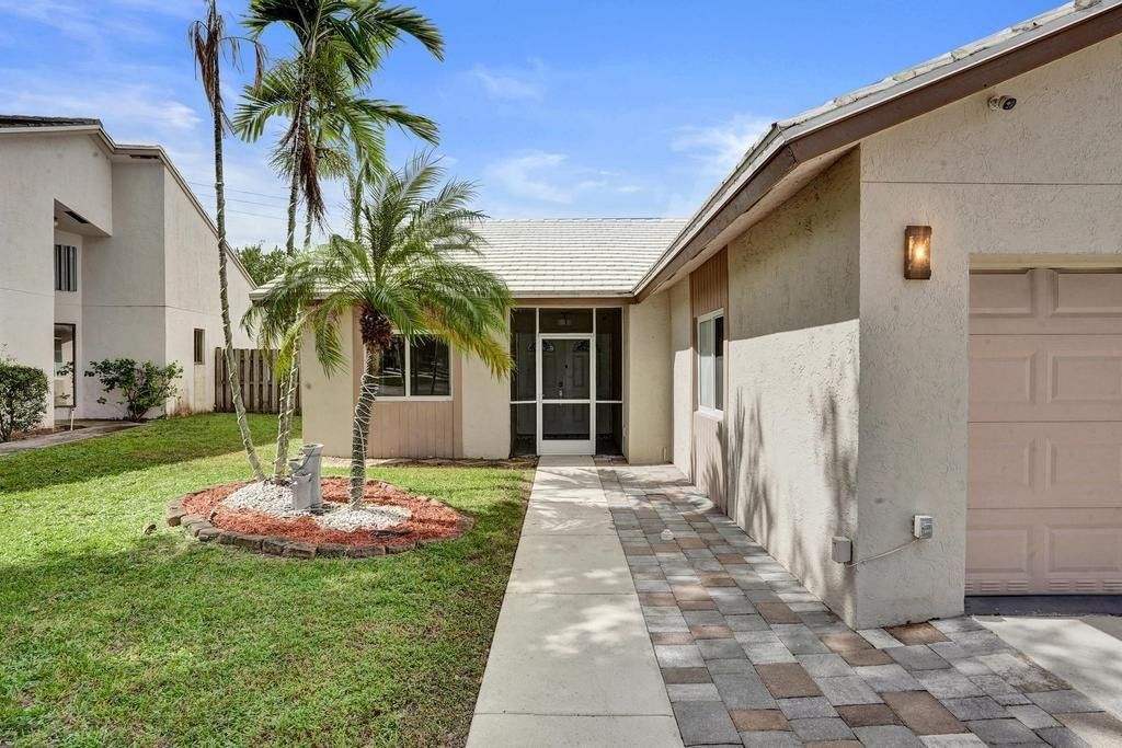 Photo of 6128 Strawberry Lakes Circle, Lake Worth, FL 33463 (MLS # F10528748)