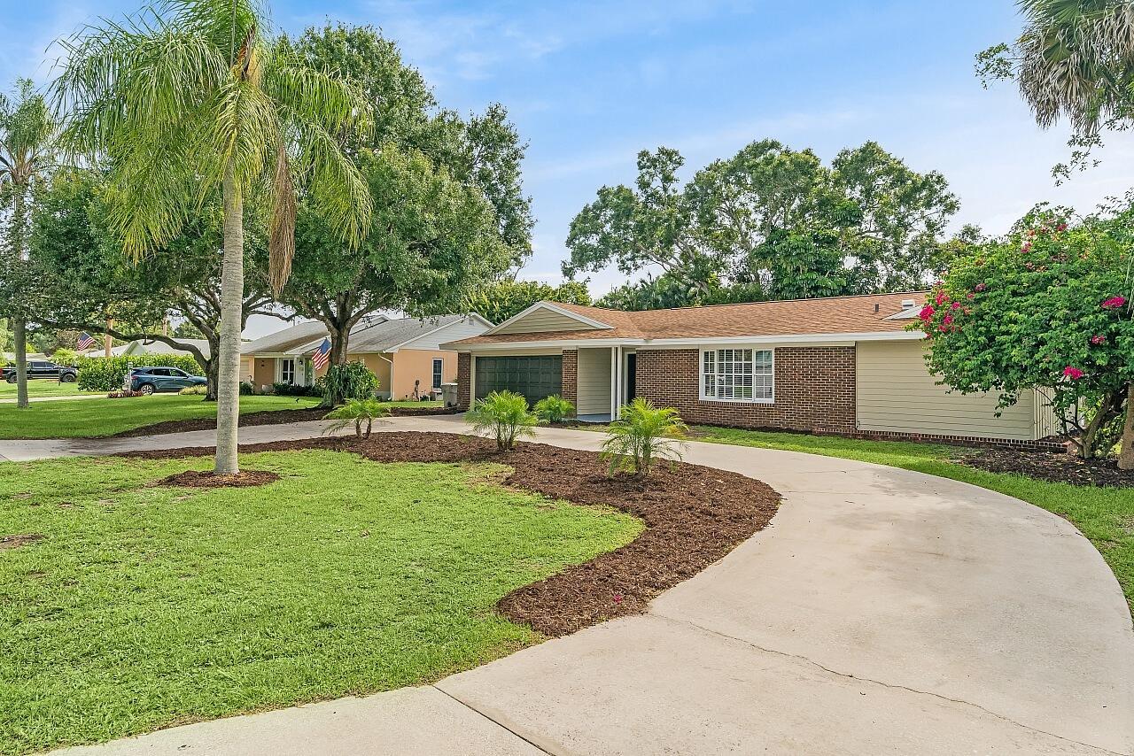 Incredible opportunity to own a POOL home in the heart of town. Endless improvements include a 2020 Roof, 2020 water heater, updated kitchen & bathrooms, new flooring, fresh interior/exterior paint, new ceiling fans/lighting fixtures/baseboards + more. Bonuses of the home include a cozy fireplace, circular driveway, covered/screened patio, loads of closet space, hurricane shutters, a generous living area + spacious garage w/ service door! Only a 15 minute drive to Vero's pristine beaches & conveniently located near grocery stores & every day conveniences while tucked away on a quiet street. FHA allowed on 8/13