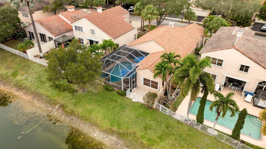 Photo of 6660 NW 75th Place, Parkland, FL 33067 (MLS # B26029292)