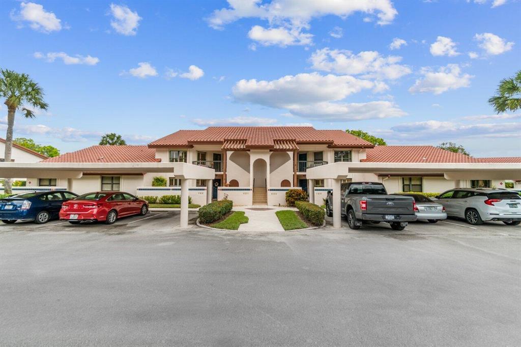 This fully furnished 2nd floor condo is located in the coveted 55+ community of Montego Cove. The spacious kitchen features wood cabinets, granite counters, and a breakfast area. Each bathroom has a walk-in shower for easier accessibility. The vaulted ceilings and natural lighting makes this condo feel airy and homey. The two walk-in closets allows for plenty of storage. The impact glass-enclosed porch overlooks the beautiful lake. The patio on the ground level is perfect for grilling and entertaining guests. There is also additional storage on the ground floor. Community features social and recreational activities, over 50 acres of park-like grounds, 2 pools, and 2 well-lit tennis courts. Community is gated and completely walled-in.