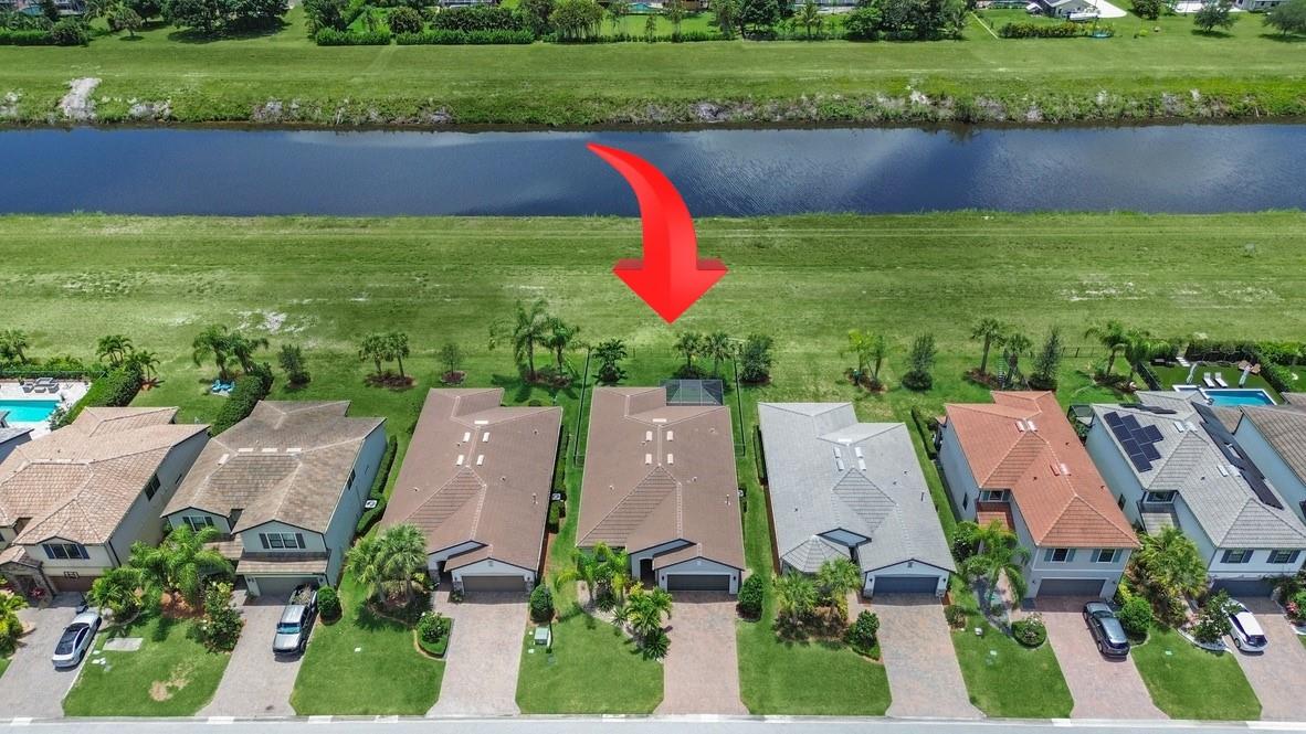 SELLERS HIGHLY MOTIVATED! Welcome to 788 SE Villandry Way, where quality meets location! Built in 2020 and gently lived in, this 4bed/3bath, provides the benefits of a newer build without the stress of builder, weather or material delays. Hard to find one level 4bed Home in gated Veranda Gardens! Enjoy upgrades including chef's kitchen cabinets, quartz countertops, hi-end light fixtures, dimmers, generator wiring, screened back porch lanai for indoor-outdoor living, epoxy-finished garage floor, total impact glass, luxurious Jacuzzi and premium lot! Ride your golf cart to Publix, restaurants, shopping less than a mile away. Recently sold out Veranda Gardens, has low HOA fees. Schedule your tour of this turnkey pristine clean home today! Bring your sunglasses for the sunrise sunset views!