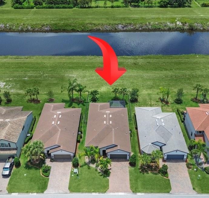 SELLERS HIGHLY MOTIVATED! Welcome to 788 SE Villandry Way, where luxury meets convenience! Built in 2020 and barely lived in, this 4bed/3bath, 1,972 SqFt of living space and a total of 2,410 sq ft home offers perks of new construction without builder delays or punch lists. Amenities galore in gated Veranda Gardens! Enjoy seller investment in premium upgrades: huge Jacuzzi, gourmet kitchen cabinets, quartz countertops, elegant lighting, oversized patio with pavers, screened lanai, epoxy garage floor, impact glass and more! Golf cart to Publix, restaurants, shopping under a mile away. Located in sold-out Veranda Gardens with low HOA fees and lawn service included, this turnkey home won't last! CALL NOW TO SECURE YOUR SHOWING!