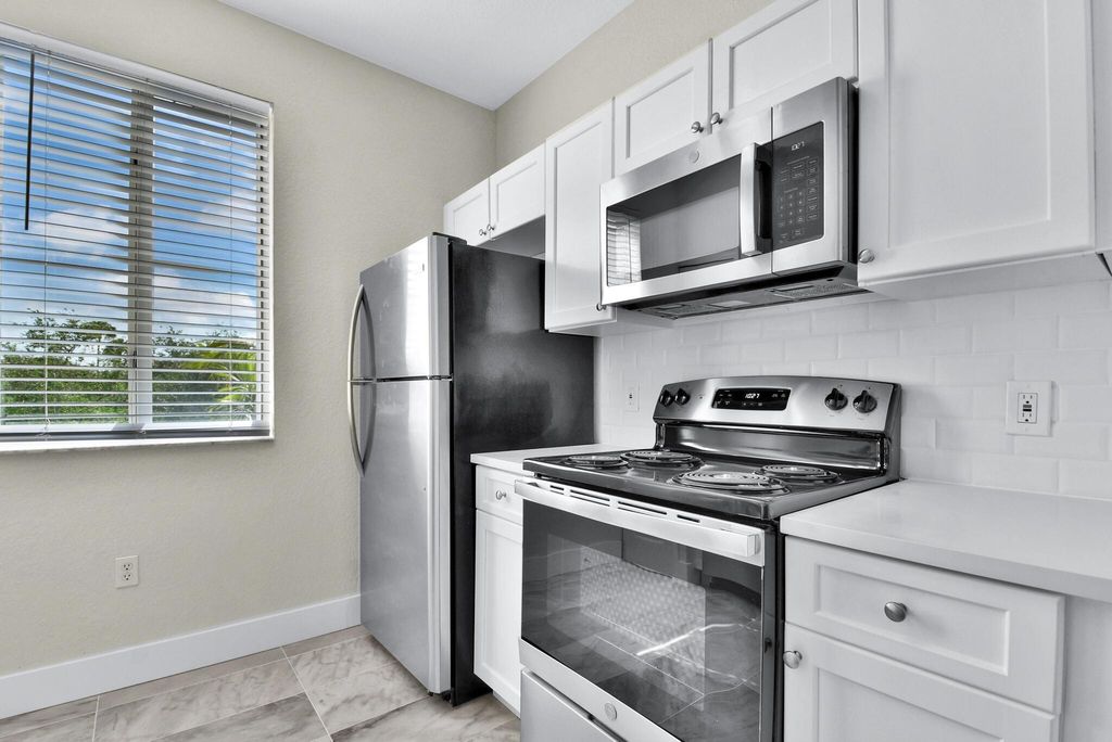 Photo of 11032 Legacy Drive #302, Palm Beach Gardens, FL 33410 (MLS # R11008507)