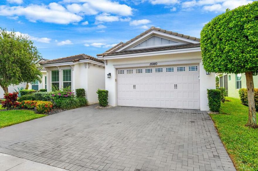 Nestled in the sought-after Hammocks of Westlake, this stunning 3-bedroom, 2-bath home offers the perfect blend of comfort and upgrades. Step outside to enjoy an incredible backyard view with a full turf yard and your very own putting green; ideal for relaxation, entertaining and watching breathtaking Westlake sunsets. Inside you'll find upgraded tiling, granite and a wine fridge great for entertaining. This home has brand new appliances. The spacious 2-car garage has been enhanced with custom storage cabinets to keep everything organized. Enjoy the extra space and ease of an extended driveway. Worried about amenities? The City of Westlake provides exceptional HOA benefits, making this community even more desirable.This home is priced to sell, don't miss your chance to make it yours!