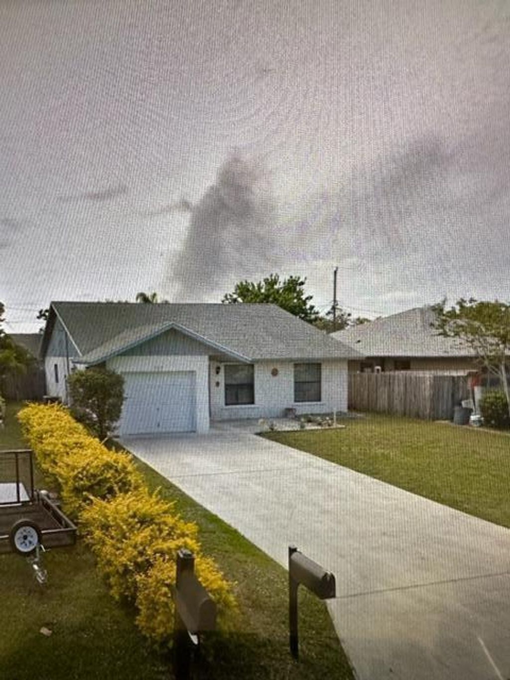 Photo of 5914 SE Wilsie Drive, Stuart, FL 34997 (MLS # R10873589)