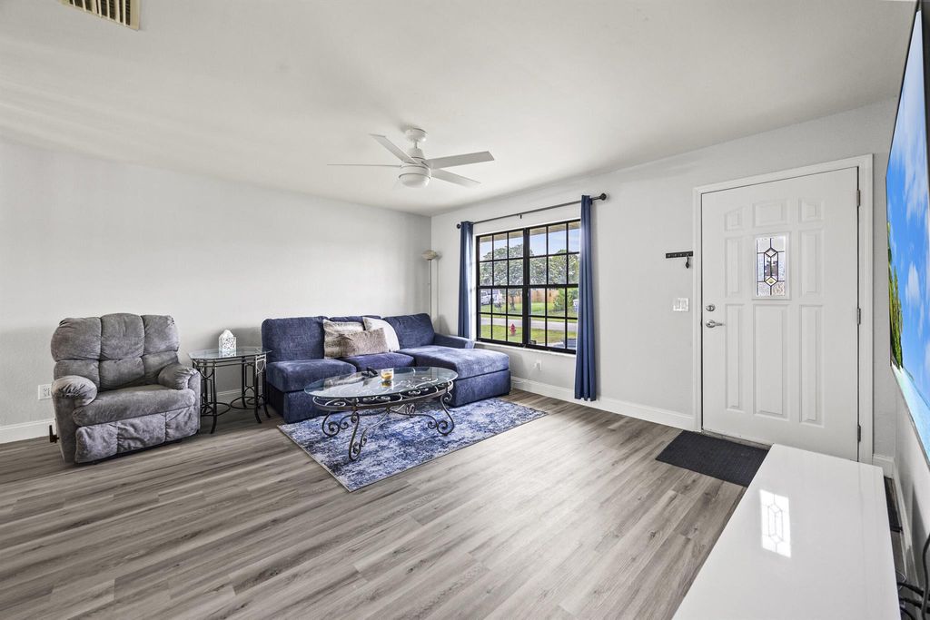 Photo of 621 SW Stillman Avenue, Port Saint Lucie, FL 34953 (MLS # R11114982)