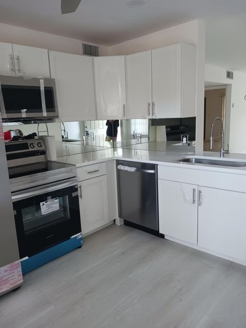 Photo of 4702 Martinique Drive #F3, Coconut Creek, FL 33066 (MLS # B26005244)