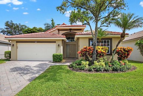 Photo of 5891 Royal Isles Boulevard, Boynton Beach, FL 33437 (MLS # F10518745)