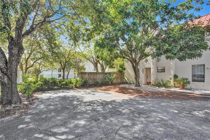 This beautifully maintained 3 bathroom, 2 1/2 bath Boca Raton townhome, close to FAU and the beach, features over $30,000 in recent upgrades, easy to maintain ceramic and vinyl wood floors, screened lania, shaded backyard, and a community swimming pool. The updated kitchen with a large pantry features new stainless appliances, new cabinetry with quartz countertops, and stylist back splash. The spacious master bedroom suite includes a walk-in closet and bath. The two additional bedrooms have ample closet space and share a bathroom and a linen closet. There is a laundry room with new appliances, a half bath, and a storage room. This conveniently located, well-maintained home will provide a relaxed Florida lifestyle for students, professionals, or a lucky family!