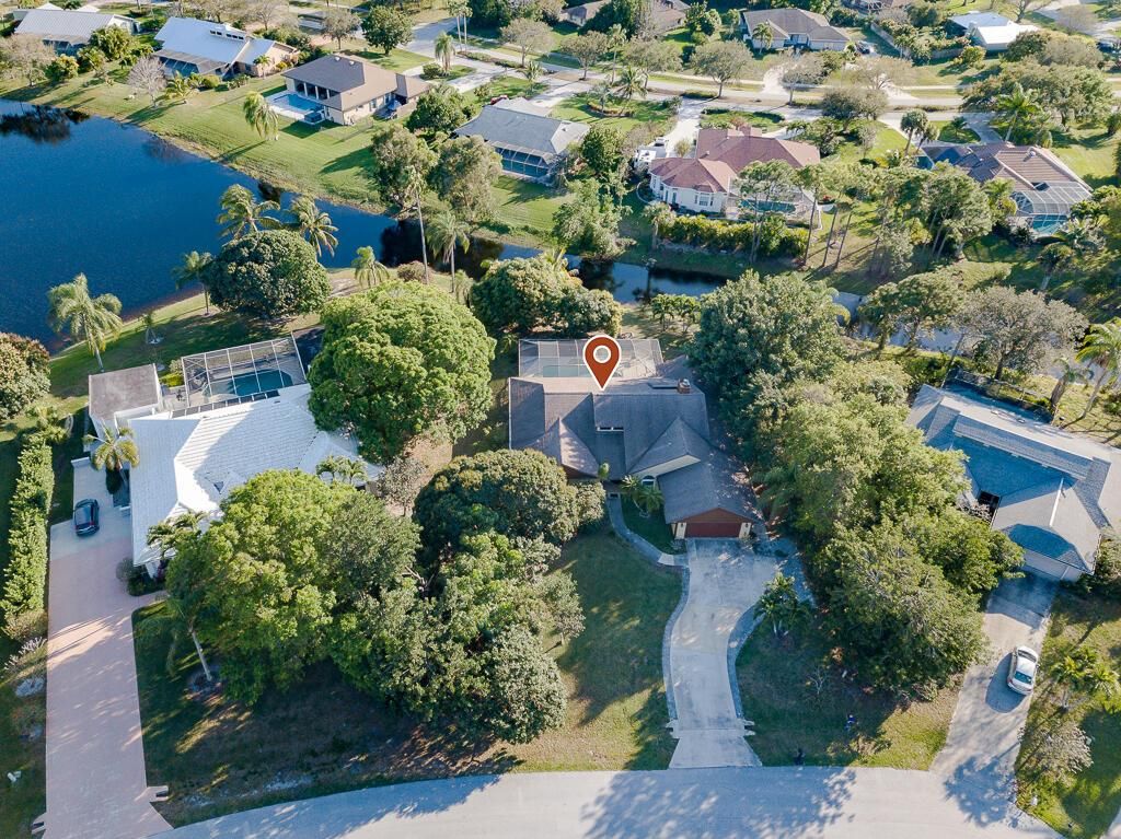 Photo of 2944 NE Loquat Lane, Jensen Beach, FL 34957 (MLS # R10874152)