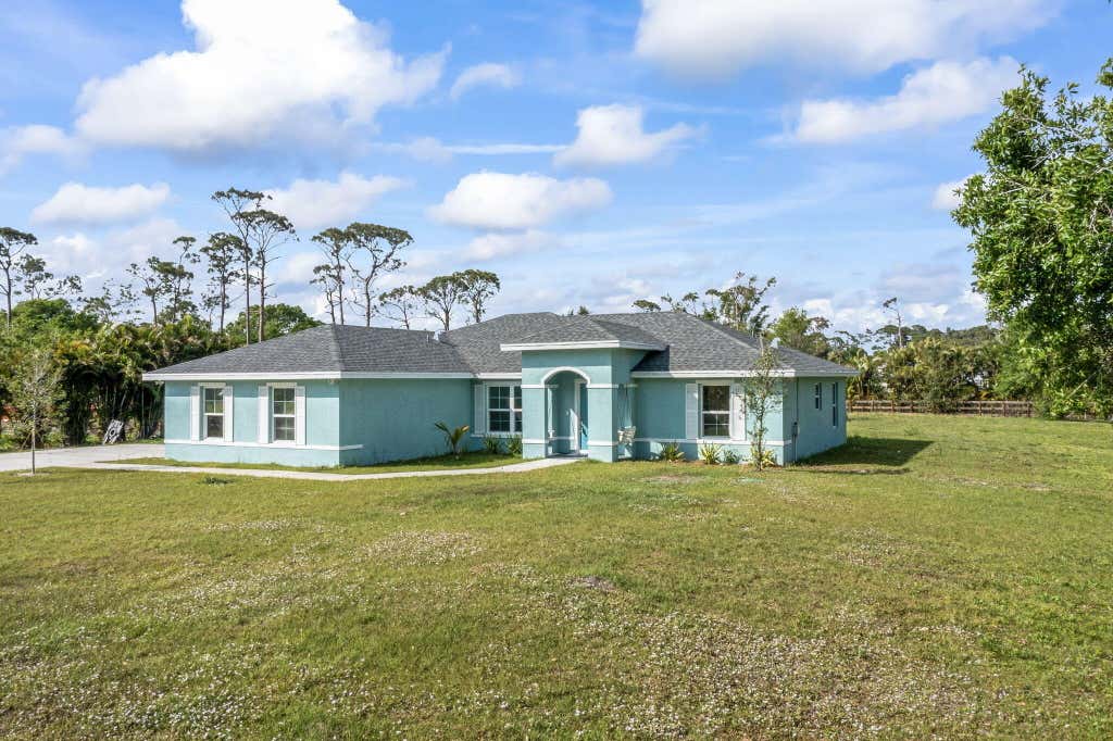 Photo of 8682 Lonesome Pine Trail, Fort Pierce, FL 34945 (MLS # R11066759)