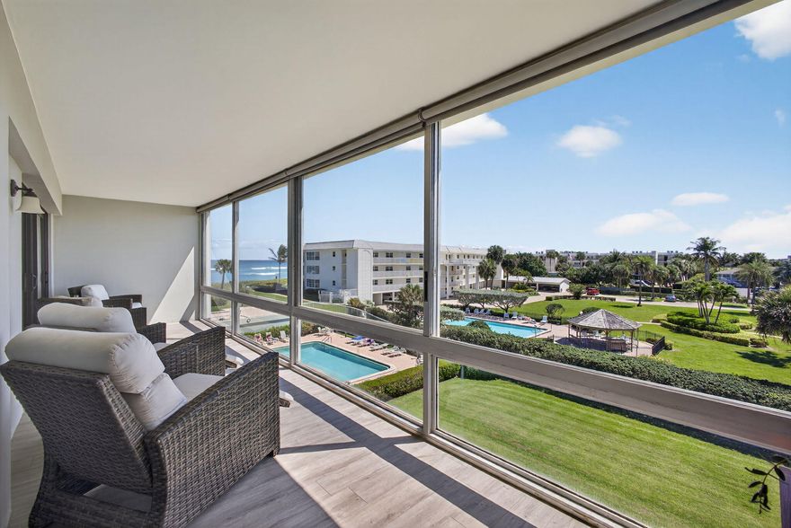 Wake up to the Atlantic Ocean breezes and end your day with sunset skies in this renovated top-floor 55+ condo at the Barclay Club in Juno Beach. This 2-bed, 2-bath coastal retreat offers ocean views from your private porch, with the beach just steps away. Beautifully updated from the designer kitchen with white soft-close cabinetry, granite countertops, stainless steel appliances, and wine fridge, to the seamless vinyl wood-look flooring throughout. Both bathrooms reflect a clean, modern coastal aesthetic with granite finishes and beautifully tiled showers. Washer/Dryer in the unit, impact sliders, recessed lighting complete the space, delivering both style and peace of mind. Deeded covered carport, private storage, pool, beach access, walk to restaurants & 20 minutes to PB airport. Some of the upgrades to unit 309 include; New A/C in 2023, Roof Replaced around 2021, Water Heater in 2021, Crown Molding in Living Room, Electrical was updated and Recessed Lighting,  Front door and Kitchen Door Replaced 2024, Impact Sliders Installed Leading to Balcony, The Balcony has Sliding Glass Panels and Sliding Screens with Motorized Window Shades, Window Blinds in Guest and Kitchen 2021, Built in Custom Closet in Primary. Juno Beach is the perfect location and ready for you to move in!