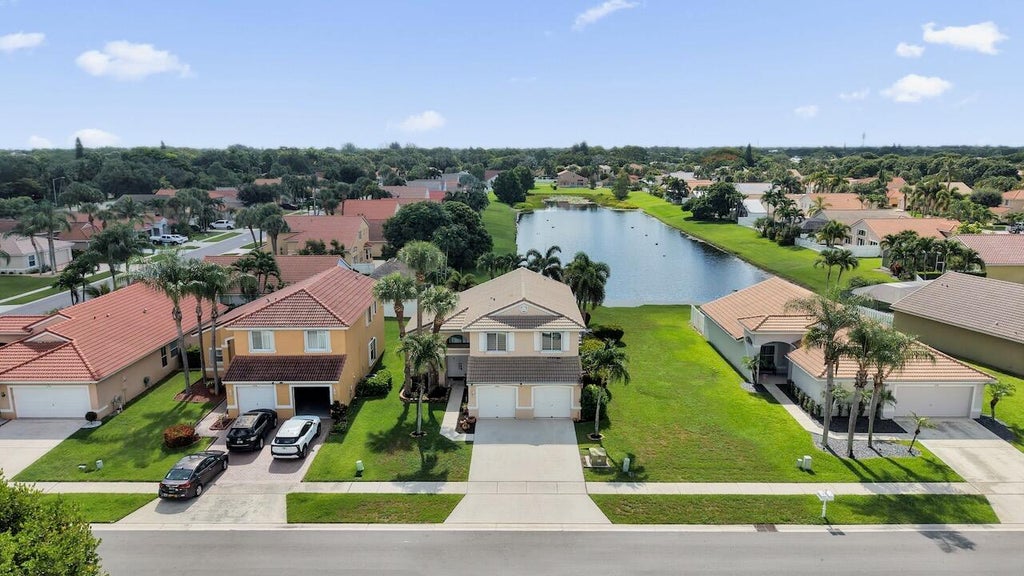 Photo of 5222 Prairie Dunes Village Circle, Lake Worth, FL 33463 (MLS # B26047122)