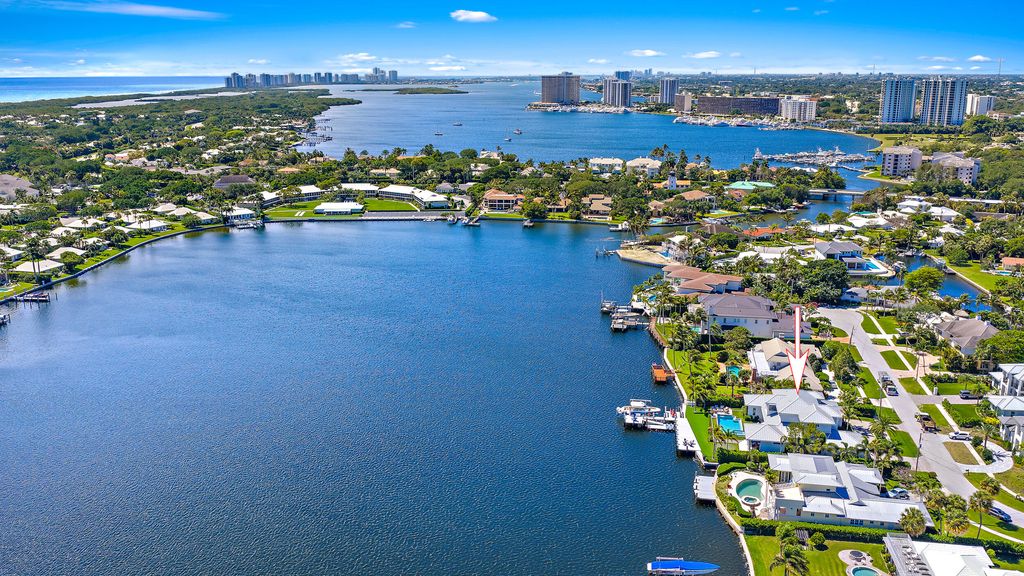 Photo of 11730 Lake Shore Place, North Palm Beach, FL 33408 (MLS # B26024356)