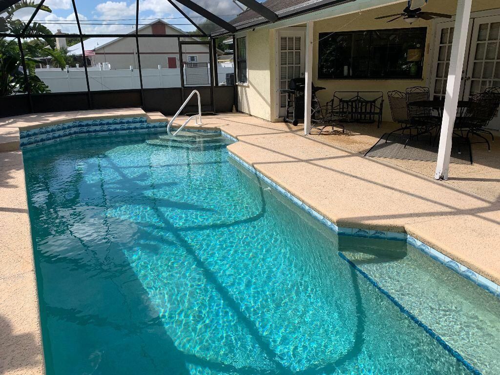 Photo of 586 SE Penn Avenue, Port Saint Lucie, FL 34952 (MLS # R10893679)