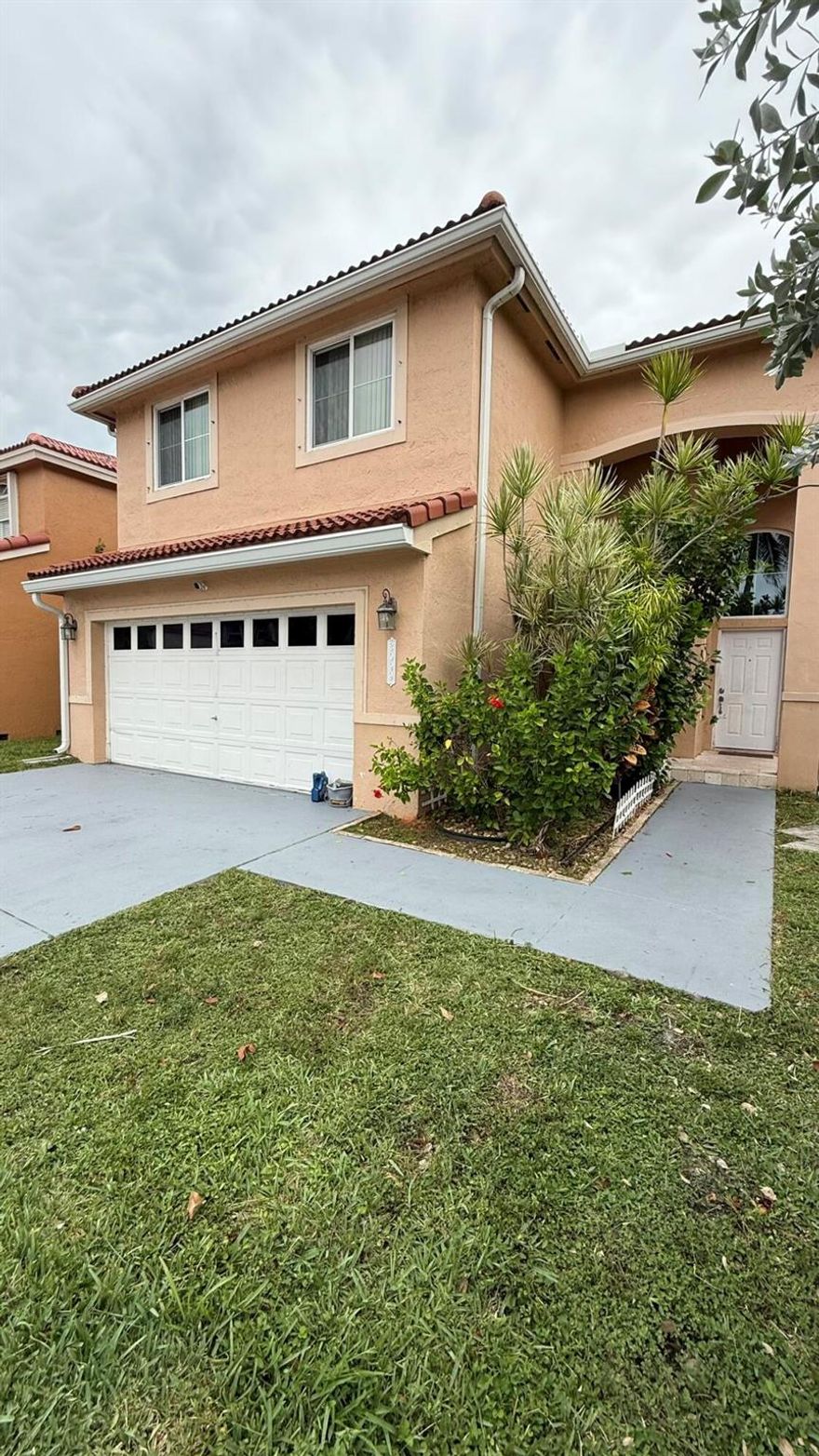 Welcome to this spacious and well-maintained 4-bedroom, 2.5-bathroom home located in a desirable Margate neighborhood. Offering the flexibility to convert into a 5-bedroom, this two-story residence is perfect for growing families or those needing extra space. All four bedrooms are located upstairs for added privacy, while the first floor features a versatile den or office--ideal for remote work or a guest room. The home boasts a newer roof (2020), hurricane impact windows and doors, and a newer A/C unit, ensuring comfort and peace of mind year-round. Enjoy the expansive enclosed patio/porch, perfect for entertaining or relaxing outdoors, rain or shine. The two-car garage provides ample storage and convenience. Situated just minutes from the Turnpike.